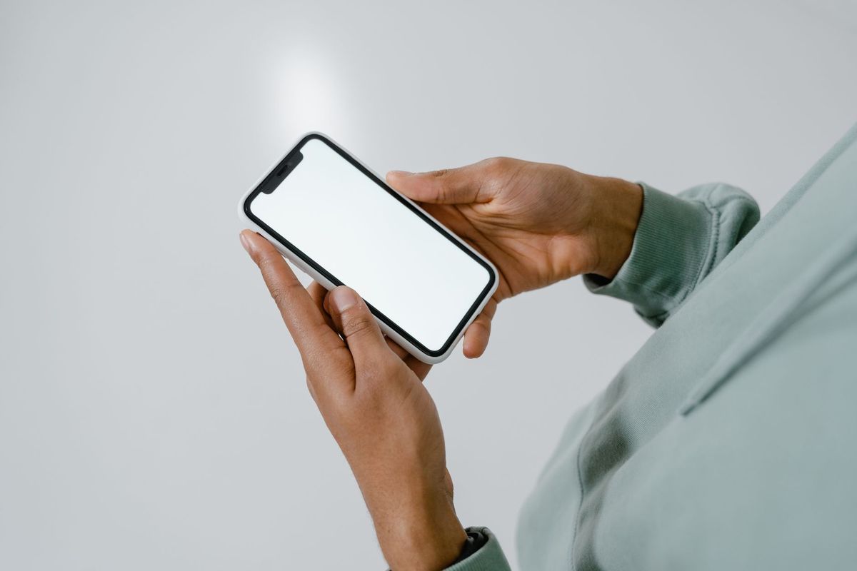 Hands holding a smartphone